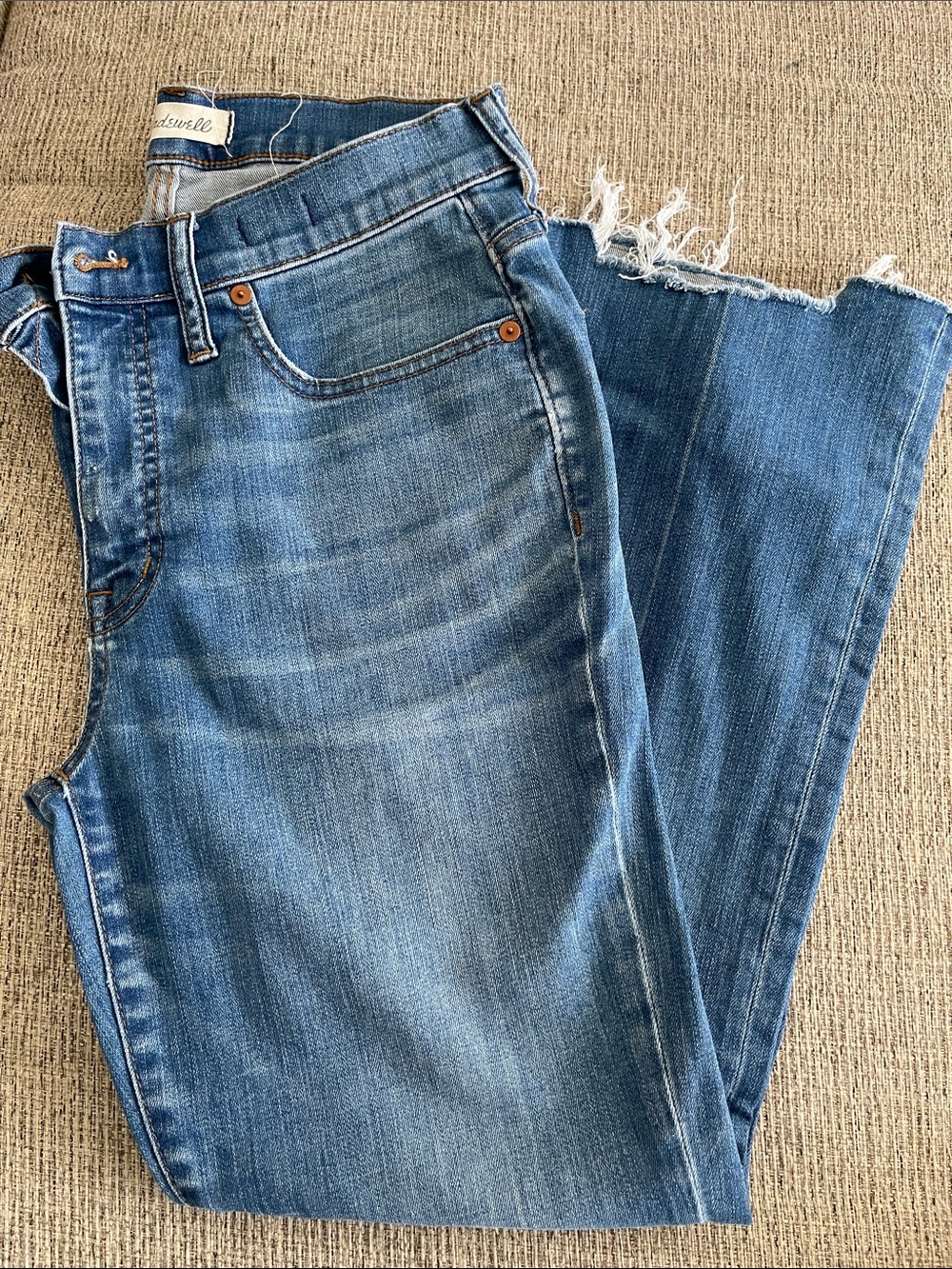 Madewell Medium Blue Flared Jeans with Frayed Hem